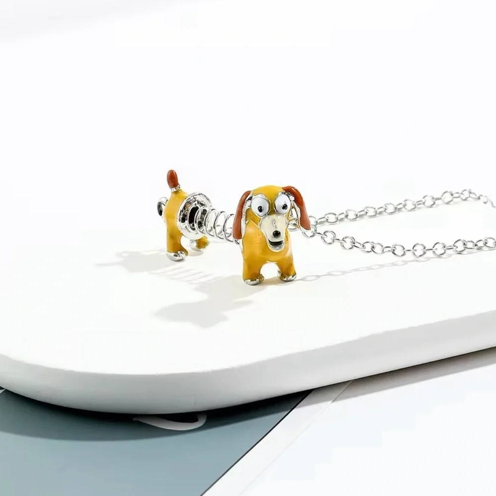 ⭐️NEW⭐️ Toy Story Slinky Dachshund Dog Pendant Necklace - Picture 5 of 8
